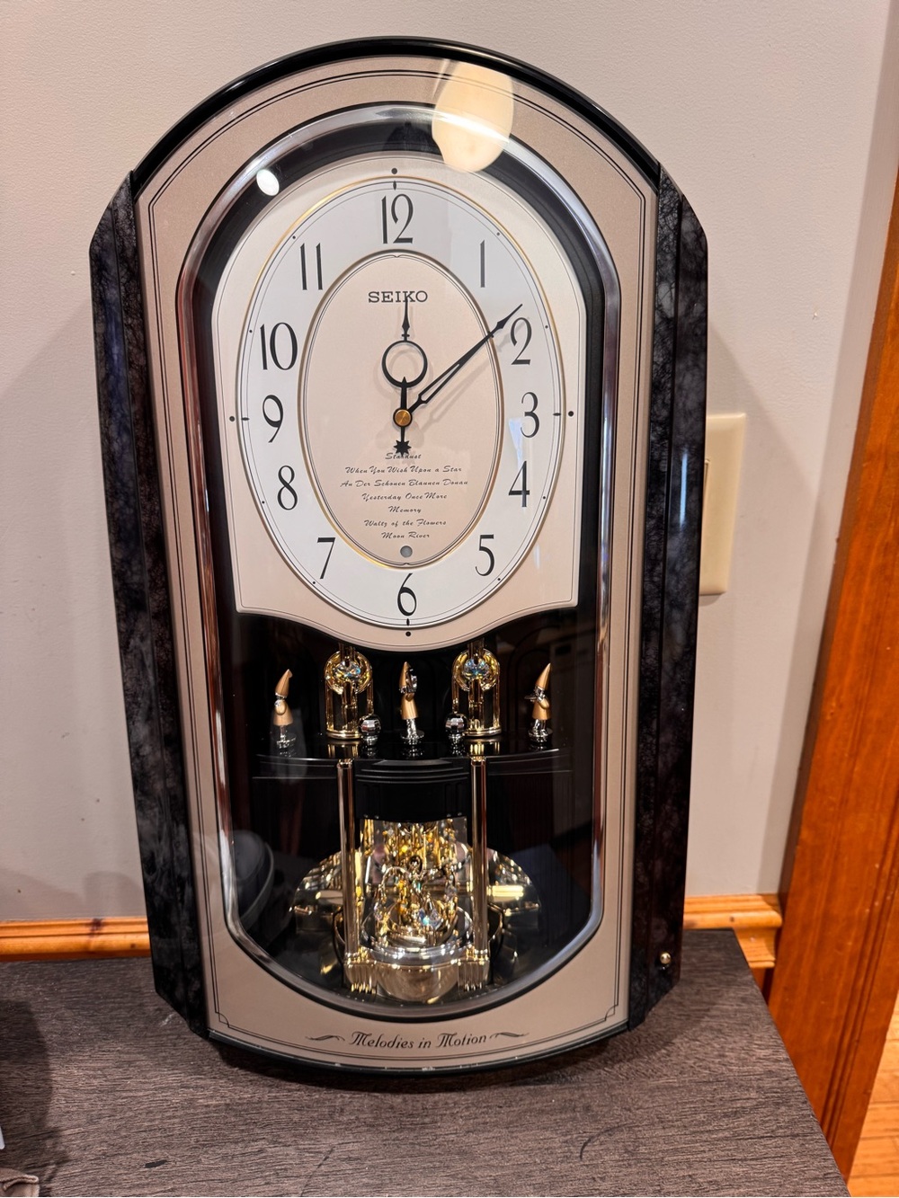 Seiko Melodies in Motion "Stardust" Clock (Model QXM329NR / QXM329BRH).